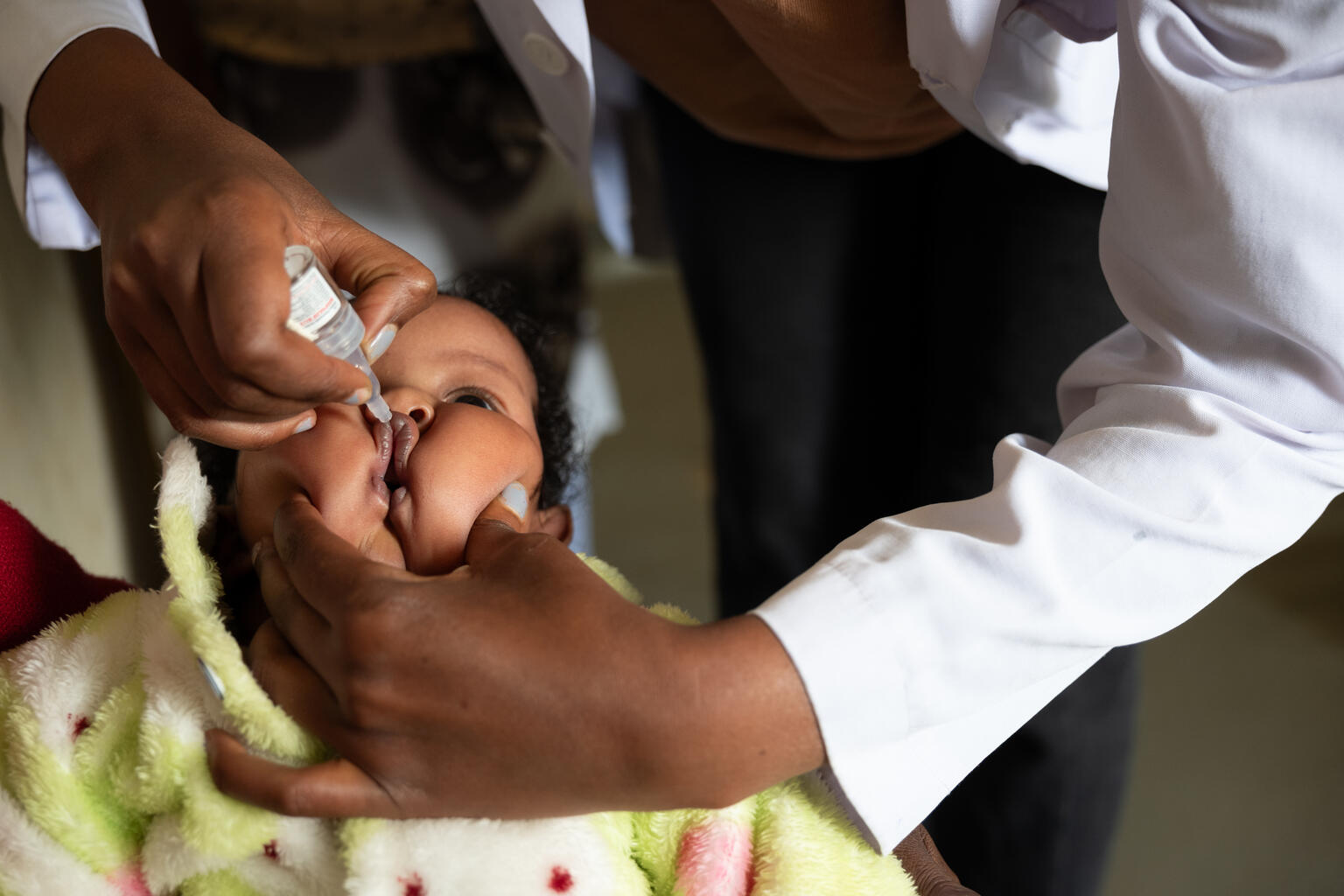 Baby Beza Bezabih 9 month gets polio vaccine at Gebrekirstos Health Center in Shebedino