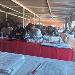 Participants listening during the Inter-faith engagement meeting in Manicaland