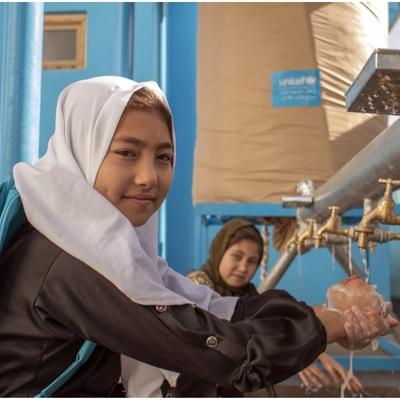 Young girls practice handwashing, showcasing how improved WASH practices foster healthier futures for Afghan children. Photo: UNICEF/Afghanistan/Khayyam