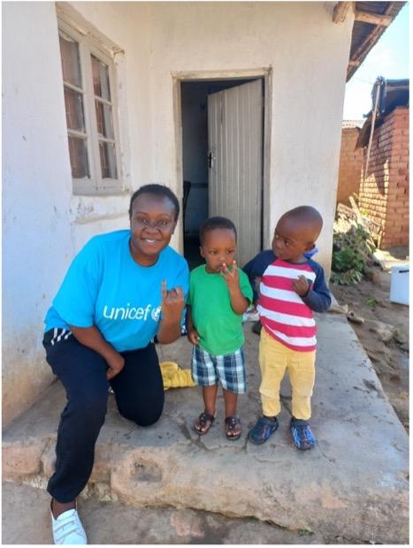 Mwenecho Mbambo, 3, and Wanangwa Mbale, 3, in Mzuzu, showing their marked fingers