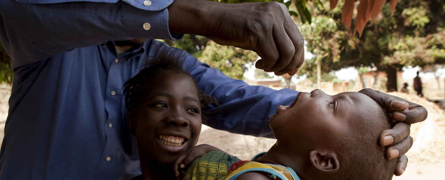 Children taking the polio vaccine drops.