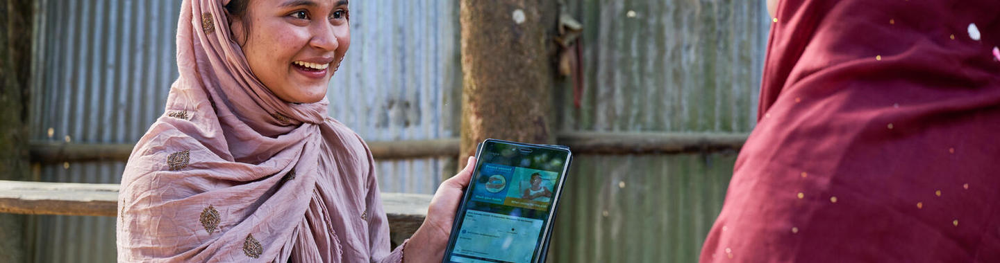 A young woman shares knowledge through digital tools, fostering connection and learning