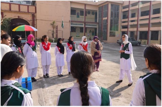 Rawalpindi: Areeba talks to young Girls Guides volunteers during a peer discussion held in a school. Photo by Shahzad Mahmood.