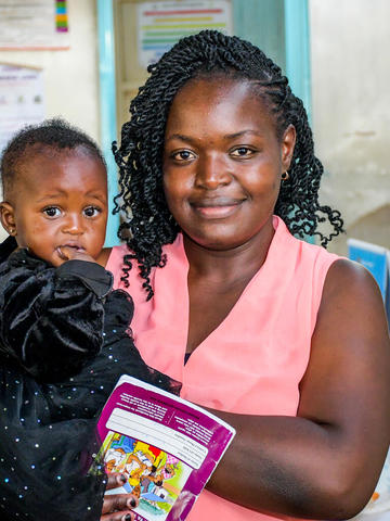 Mother holding her baby 