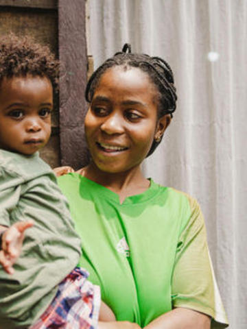 Mother holding her baby 